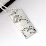 Oxidized silver tone flower..